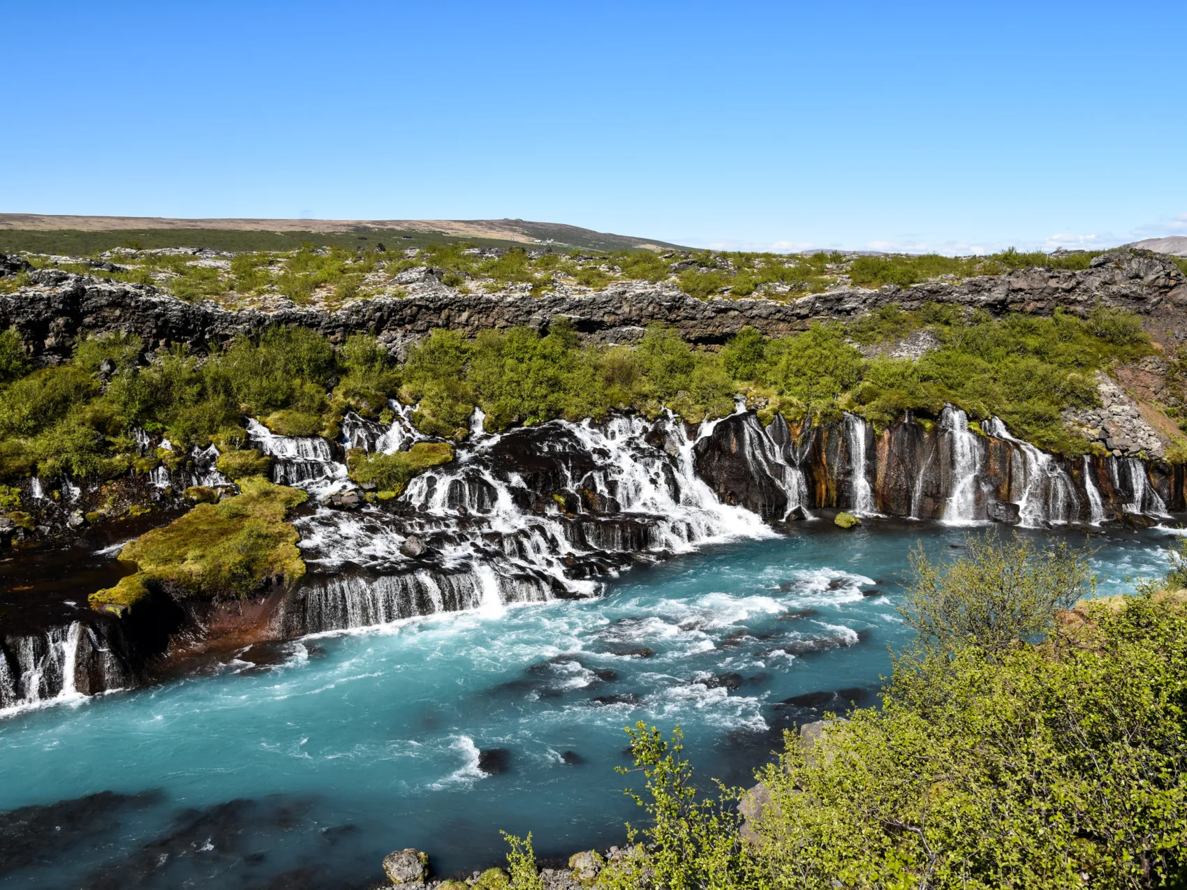 Hraunfossar Westisland Gletscherfluss Vulkangestein